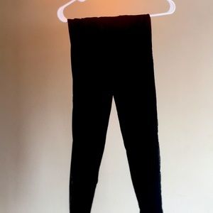 Black leggings with see-through sides